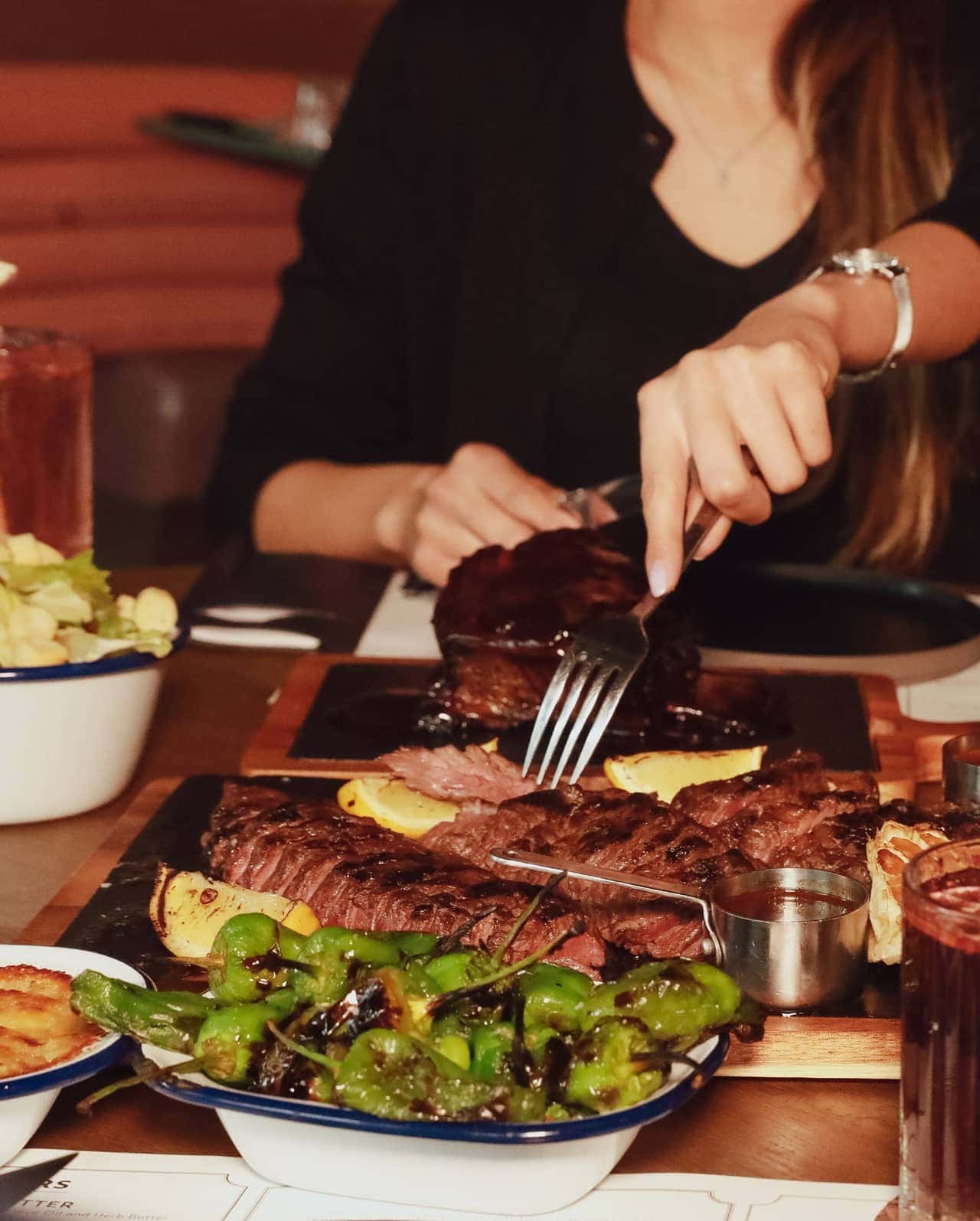 A steak seared over an open fire at The Iron Lady